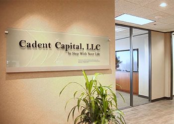 Cadent Capital LLC sign on office wall