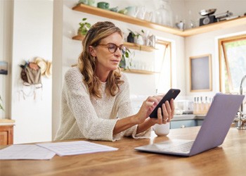 Woman saving for retirement in Irving 