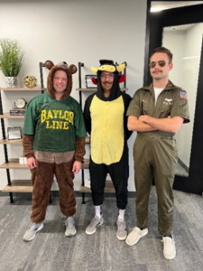 three people in costume